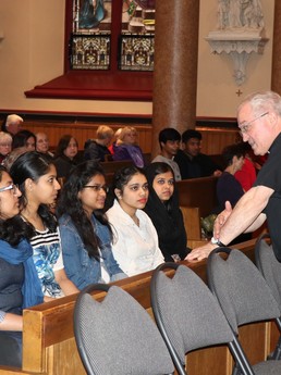 Fr. Tom Chats With Parishioners